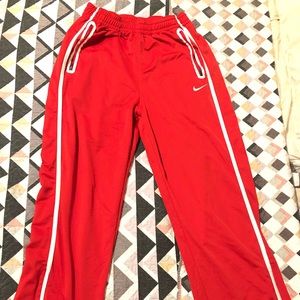 Red Nike Vintage Sweatpants. Has zipper pockets